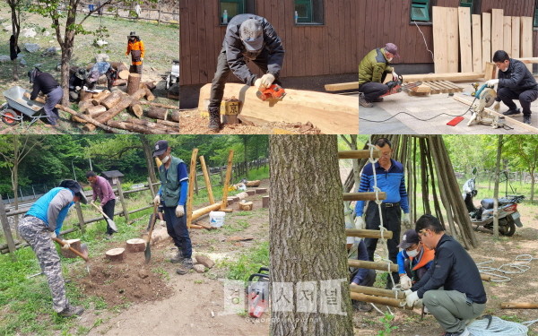 도립공원 직원들이 자연재해로 쓰러진 나무 재활용 하여 직접 놀이기구를 제작하고 있다.